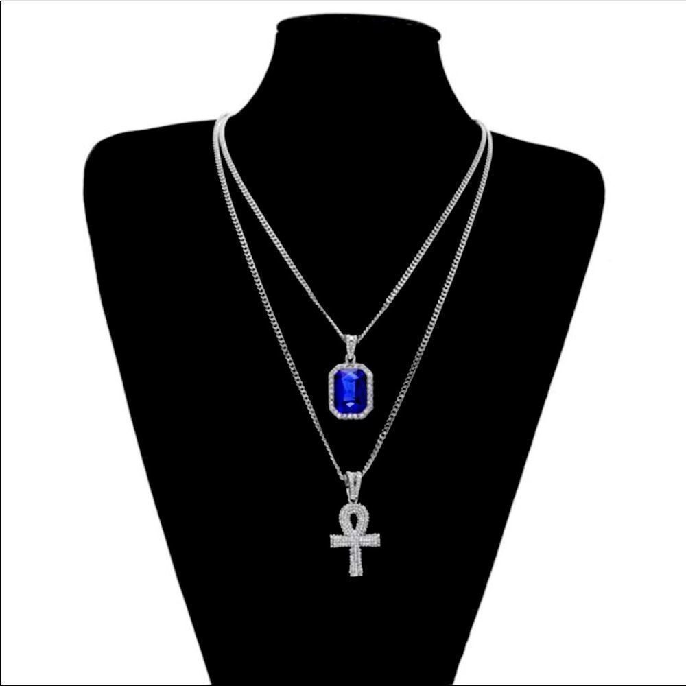 ๐โSilverโNecklacesโwithย BlueโSapphireโGemstoneโandโIcedโOutโGoldโCrossโPendant